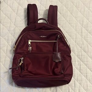 Tumi Burgundy Backpack with Gold Accents